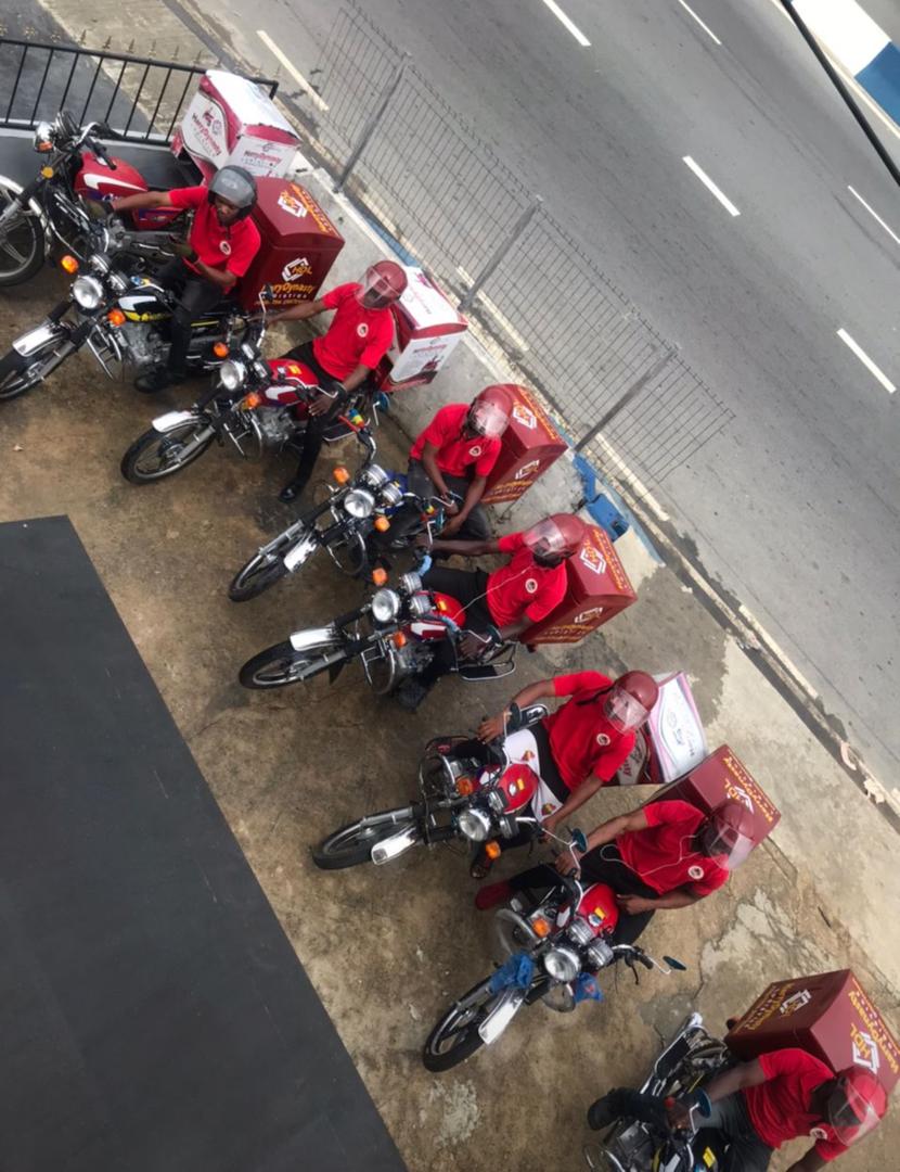 Harry Dynasty dispatch riders lined up with their delivery bikes